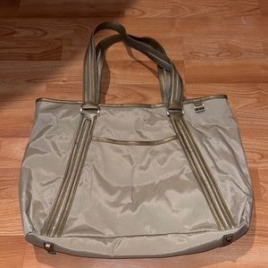 Tumi Beige Tote with Gold Trim